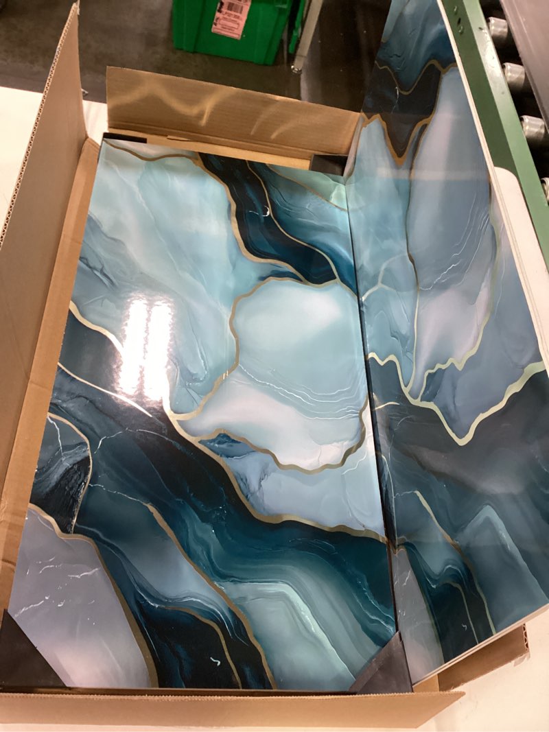 Condition photo showing Good Condition for Haimin Wall Panels Peel and Stick 10 Pieces 23.6x11.8in (19.4 Sq. Ft. Coverage) Lightweight Backsplash Marble Look Tile (not Real Marble) Ideal for Kitchen Bathrooms Living Rooms Bedrooms Blue Gold-010