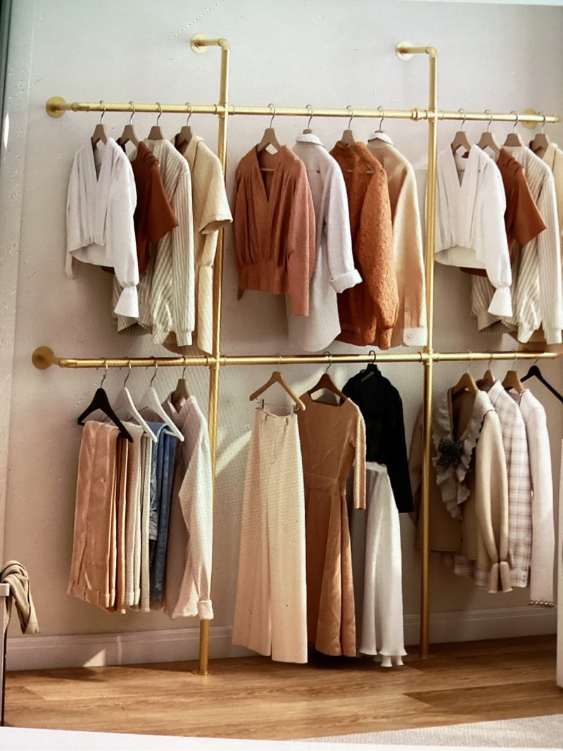gold pipe clothing rack wall mounted industrial pipe clothes *similar to stock photo & missing pieces *