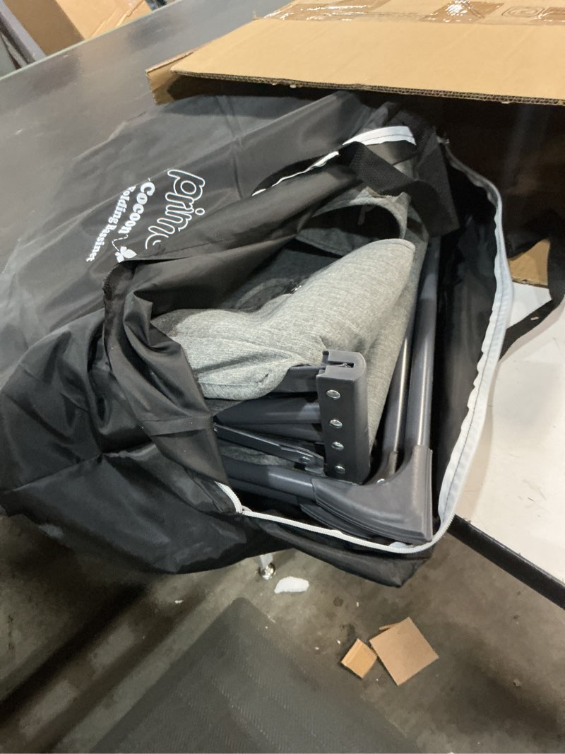 Condition photo showing As Is for cocoon deluxe folding travel bassinet (heather gray) - lightweight baby bed and portable bassinet with removable mesh canopy, perfect travel crib & bedside for baby, includes carrying tote bag deluxe heather gray