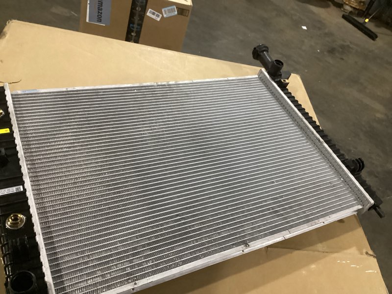 Condition photo showing As Is for (similar to )gm genuine parts 84079536 radiator