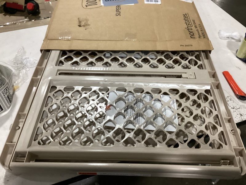 Condition photo showing Good Condition for Toddleroo by North States - Supergate Ergo Baby Gate: Plastic Baby Gate for Stairs & Doorways - Adjustable Indoor Safety Gate - Made in USA - 26 to 42 Inches Wide - 26 Inches Tall - Sand