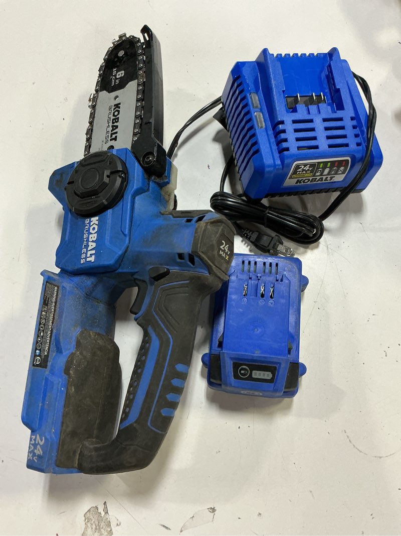 Condition photo showing As Is for kobalt 24-volt 6-in battery 2.0 ah chainsaw battery included charger included
