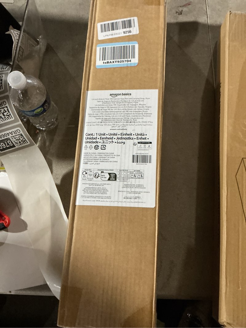 Condition photo showing Good Condition for Amazon Basics 1/4 Inch Thick TPE Exercise Yoga Mat with Carrying Strap Plum