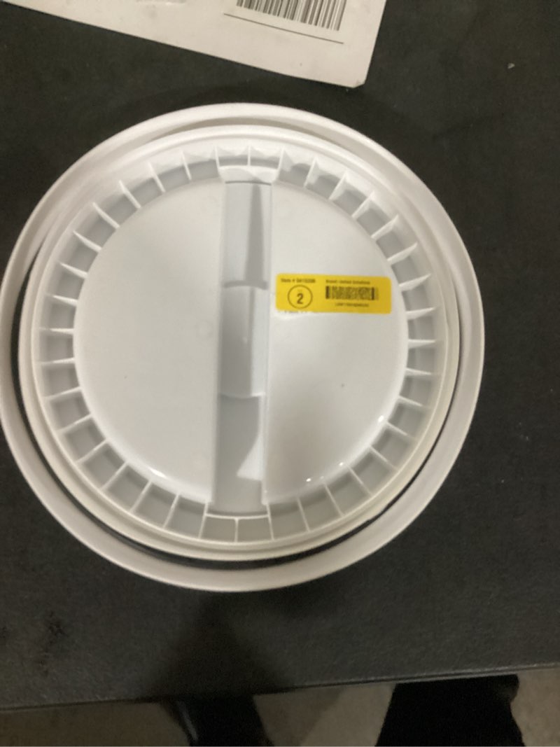 Condition photo showing As Is for united solutions 5-gallon white plastic bucket lid