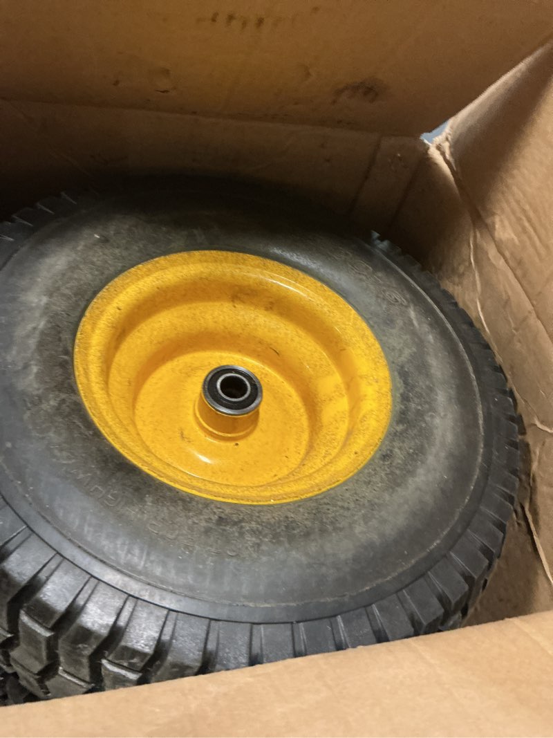 Condition photo showing As Is for 2pc 15x6.00-6 nhs flat free front lawn mower tire and wheel, 3/4" bearing with extra 5/8", compatible with most john deere 100 and 300 series mowers, 3"-4.4" centered hub, 700 lbs load capacity.