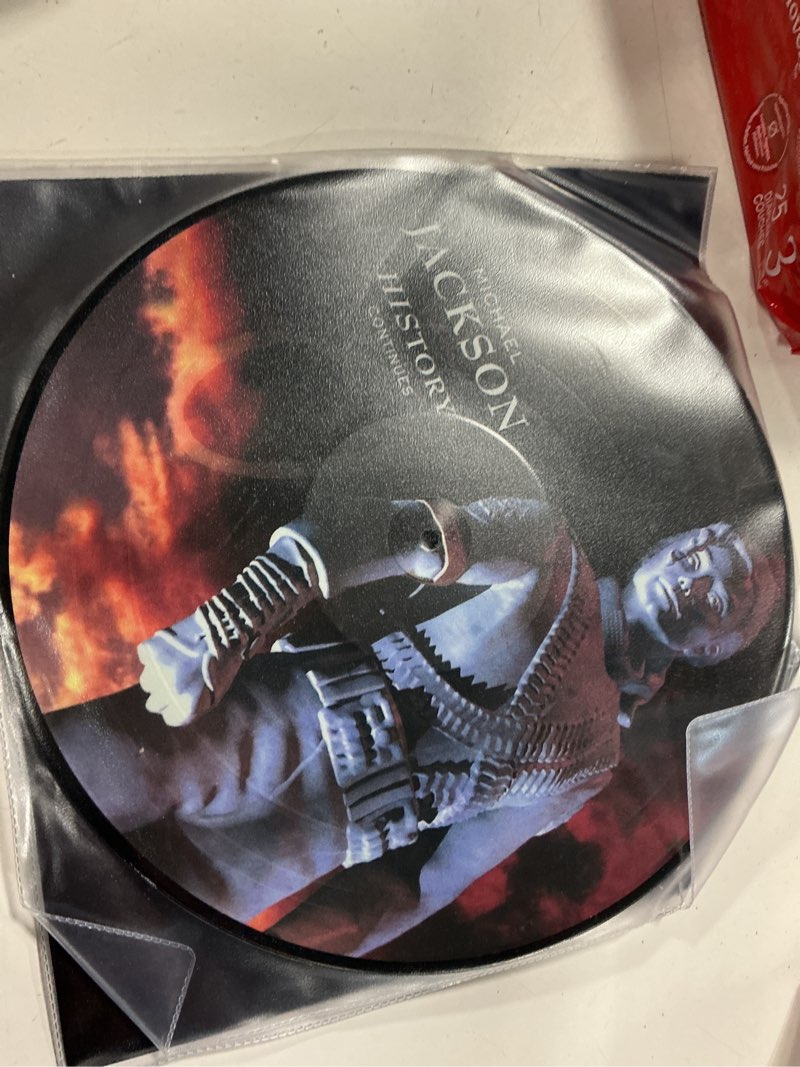 Condition photo showing New/Like New for michael jackson - history: continues (vinyl)