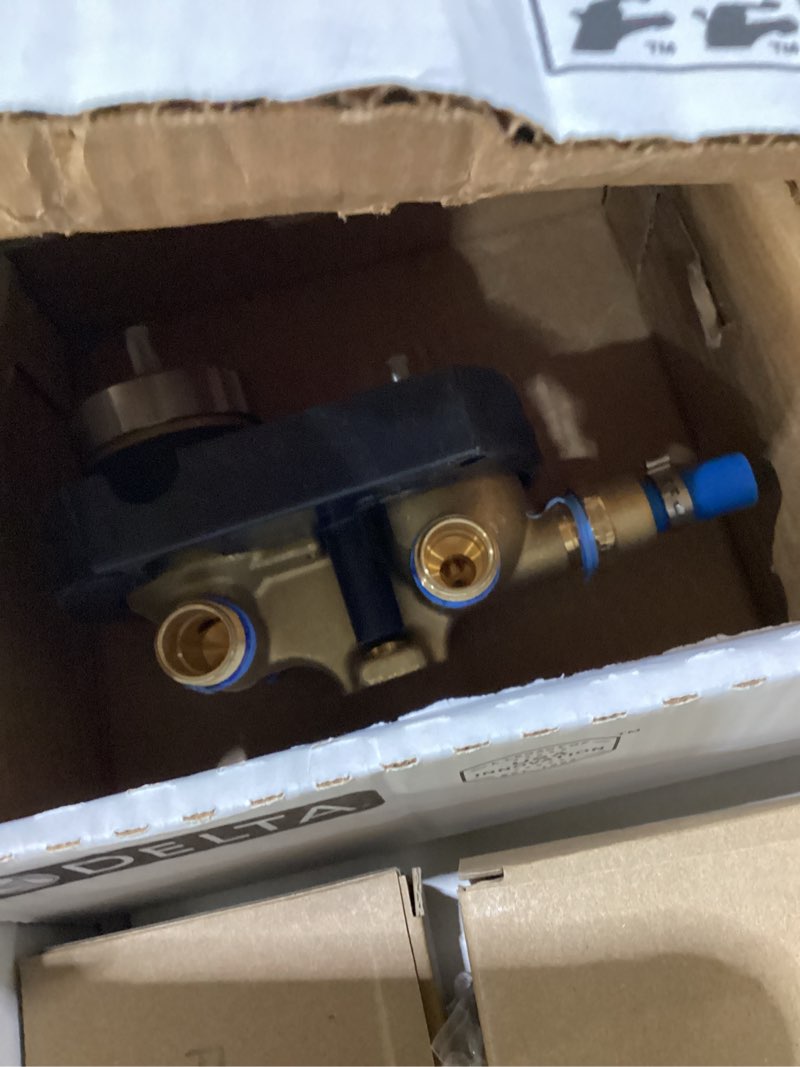 Condition photo showing As Is for Delta Modern 14 Series Square Rain Shower System Faucet Set, Rainfall Chrome Shower Head and Handle Set, Valve Trim Kit, 10 Inch, Chrome 342701