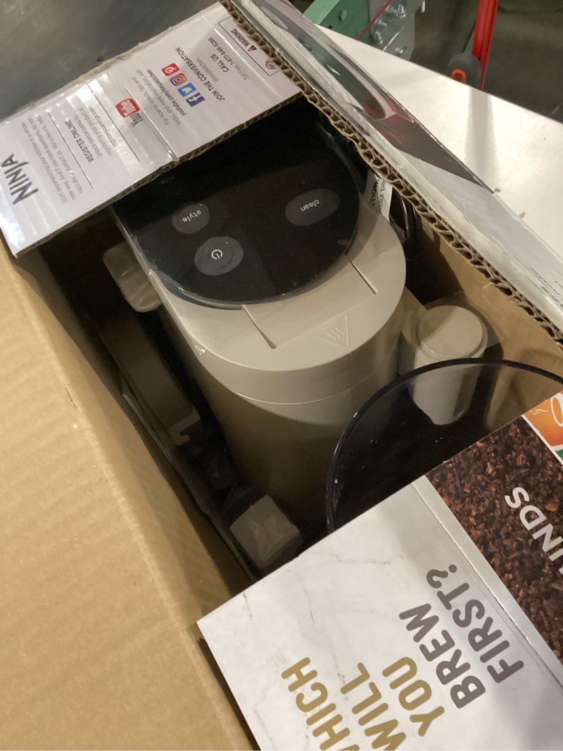 Condition photo showing As Is for Ninja Pod & Grounds | Coffee Maker | XL Single-Serve | K-Cup Pod Compatible | Brews Grounds | Compact Design | Built-In Milk Frother | 68-oz. Reservoir, 6-oz. Cup to 24-oz. Mug Sizes | Stone |PB055AST
