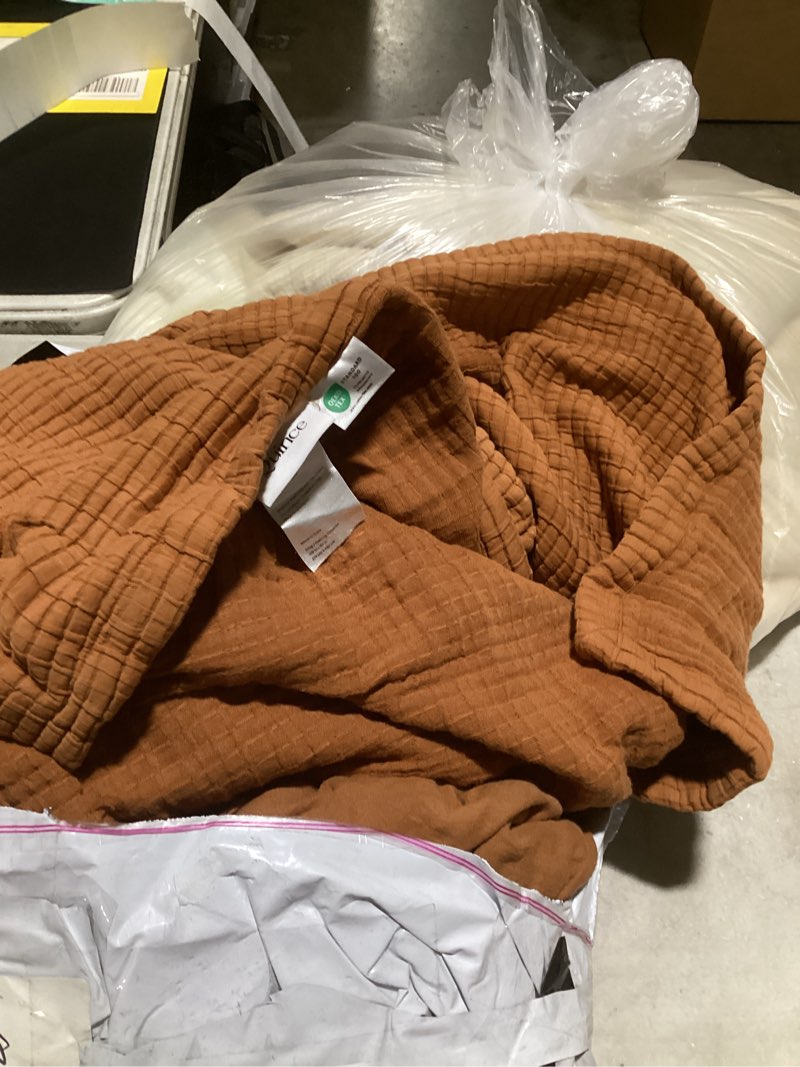 Condition photo showing As Is for organic gauze blanket, king/calking