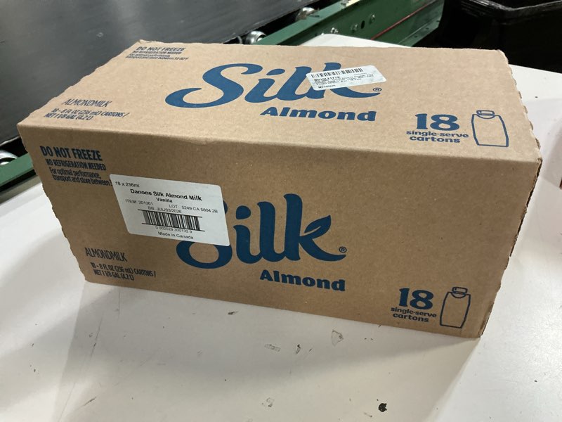 Condition photo showing New/Like New for (best by jul/03/2026) silk shelf-stable soymilk singles, very vanilla, dairy-free, vegan, non-gmo project verified, 8 oz., 18 pack very vanilla 8 fl oz (pack of 18)