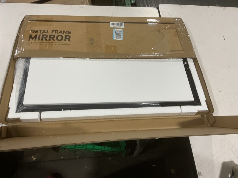 Condition photo showing As Is for keonjinn black bathroom mirrors for over sink, 20" x 30" black framed mirror for wall, tempered glass beveled edge, aluminum alloy frame, shatterproof, farmhouse rectangular bathroom vanity mirror