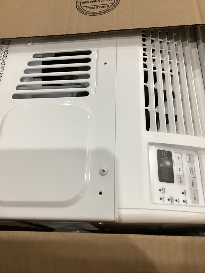 Condition photo showing As Is for lg 6,000 btu window air conditioner, 115v, cools 250 sq.ft. for bedroom, den, living room, quiet operation, with remote, 2 cooling & fan speeds, 2-way air deflection, auto restart, white 6000 btu electronic & standard white