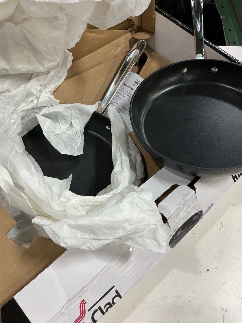 Condition photo showing Good Condition for all-clad ha1 expert hard anodized nonstick frying pan set, 2-piece 10" & 12" skillet set, dishwasher-safe, oven-safe up to 500°f compatible with all stovetops (gas, electric & induction) - black 2-piece set (10" + 12")