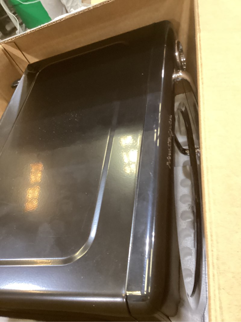 Condition photo showing As Is for nostalgia retro microwave oven - 0.7 cu ft, 700-watt countertop size with glass turntable, child safety lock, 8 auto-cook programs, digital clock - black retro 0.7 cu. ft. black