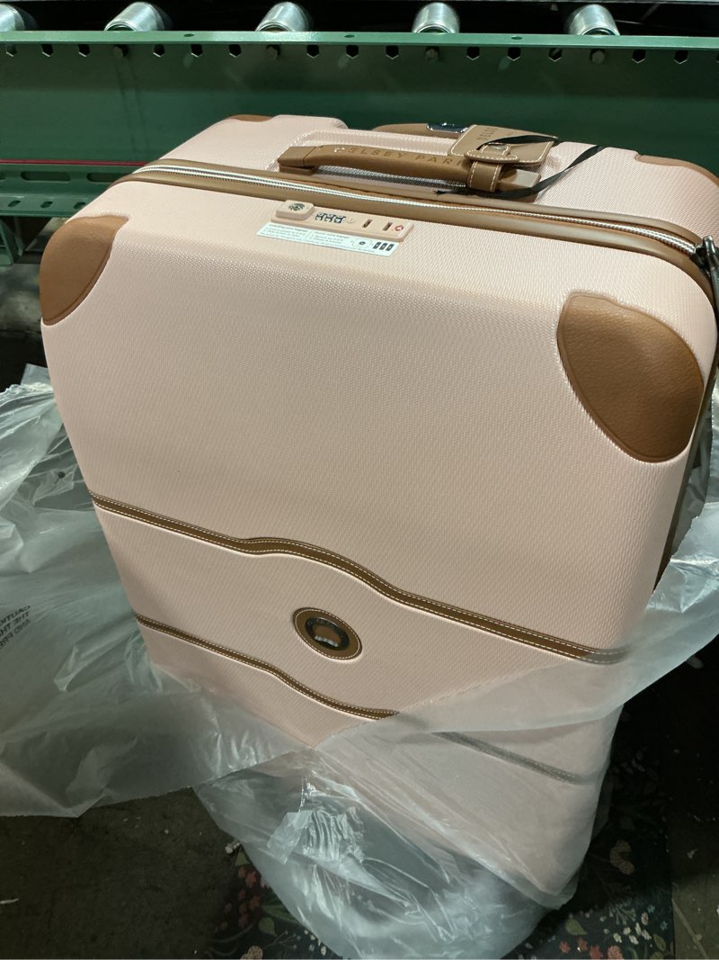 Condition photo showing Good Condition for DELSEY PARIS Chatelet Air 2.0 Hardside Luggage with Spinner Wheels, Blush Pink, Checked-Large 28 Inch Blush Pink Checked-Large 28 Inch