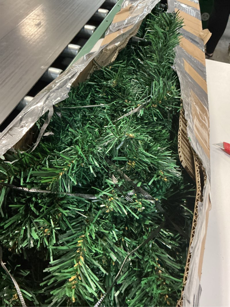 Condition photo showing As Is for KTKDE 7.5ft Artificial Christmas Tree is a Green one with 1450 Tips and 300 Battery-Powered LED Columns. It Features 7.87-inch Golden Five Pointed Star and is Perfect for Family and Office Gatherings Green 7.5ft