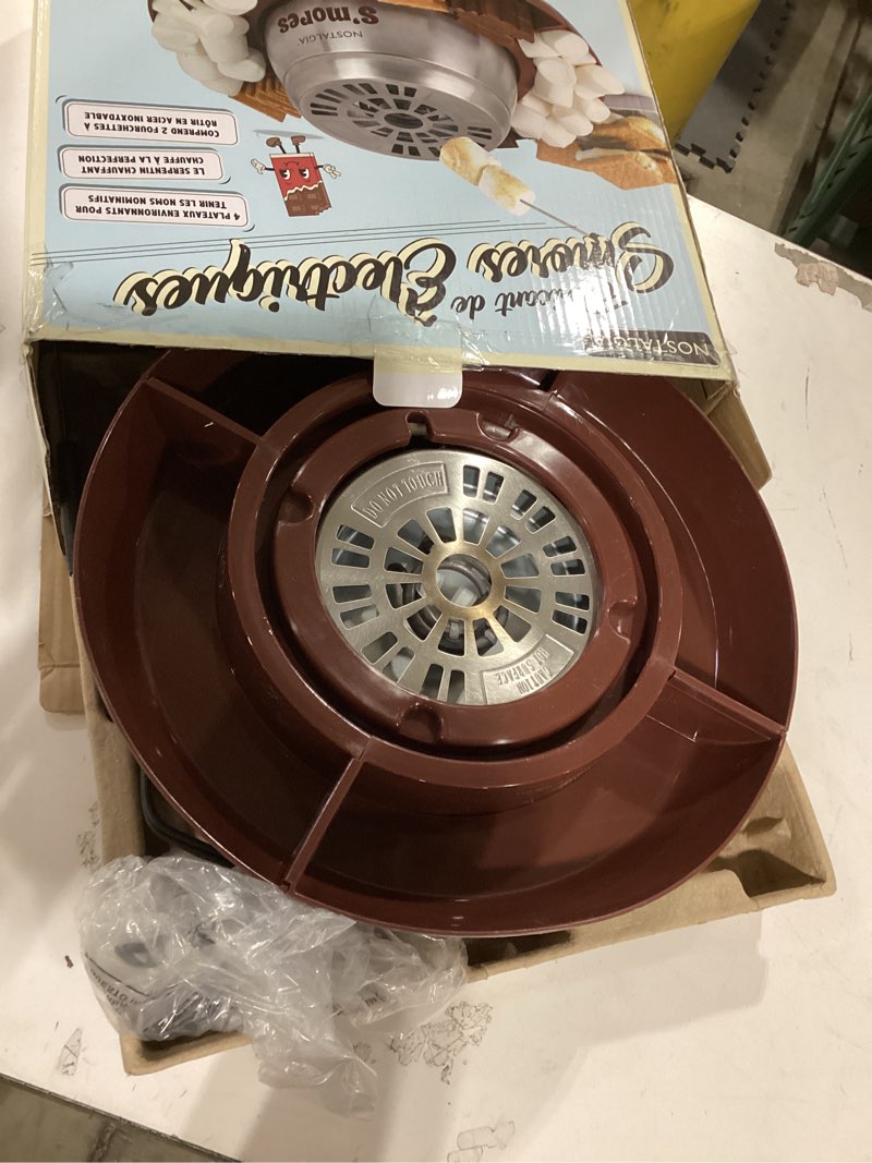 Condition photo showing As Is for Nostalgia Indoor Electric Stainless Steel S'Mores Maker with 4 Lazy Susan Compartment Trays for Graham Crackers, Chocolate, Marshmallows and 4 Roasting Forks, Brown Deluxe S'mores Maker