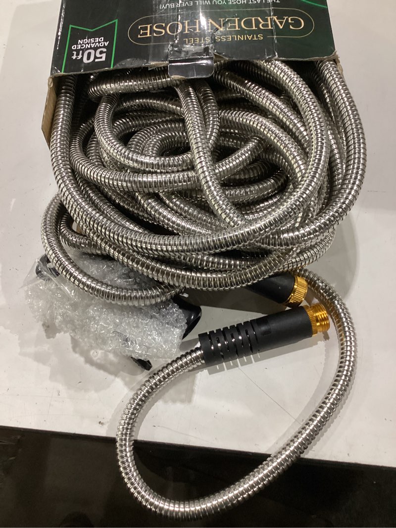 Condition photo showing Good Condition for garden hose 50 ft, metal stainless steel water hose with 10 function nozzles, no kinks, flexible hose, lightweight, puncture proof, heavy duty hose for yard and outdoor silver 50ft