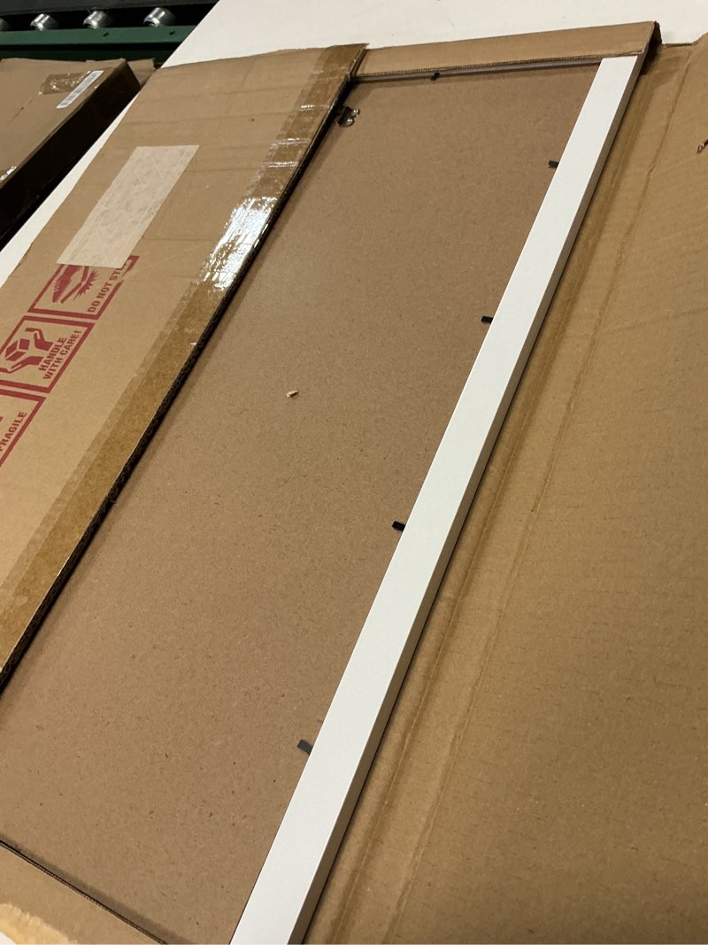 Condition photo showing Good Condition for lavie home 16 x 24 poster frame white, display pictures 12x18 with mat or 16x24 without mat, stable and sturdy picture frame and polished plexiglass, horizontal and vertical format of the wall?1 pack? 16x24 white