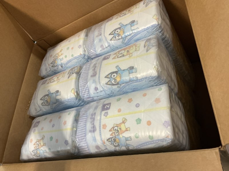 Condition photo showing New/Like New for luvs size 2 baby diapers, platinum protection bluey diapers for day & night, size 2, 264 count (packaging may vary) size 2 264