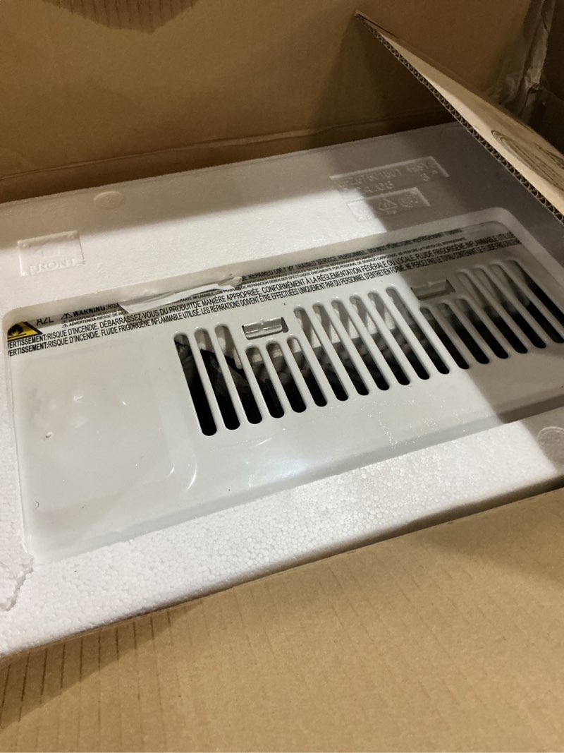 Condition photo showing As Is for lg 6,000 btu window air conditioner, cools 250 sq.ft. (10' x 25' room size), quiet operation, electronic control with remote, 2 cooling & fan speeds, 2-way air deflection, auto restart, 115v