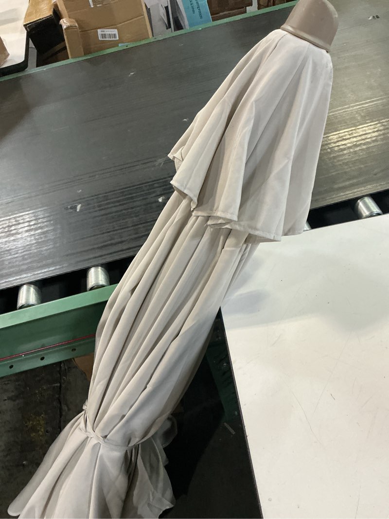 Condition photo showing As Is for sunnydaze decor sunnydaze 8.5 ft outdoor patio umbrella with push button tilt and crank - faux