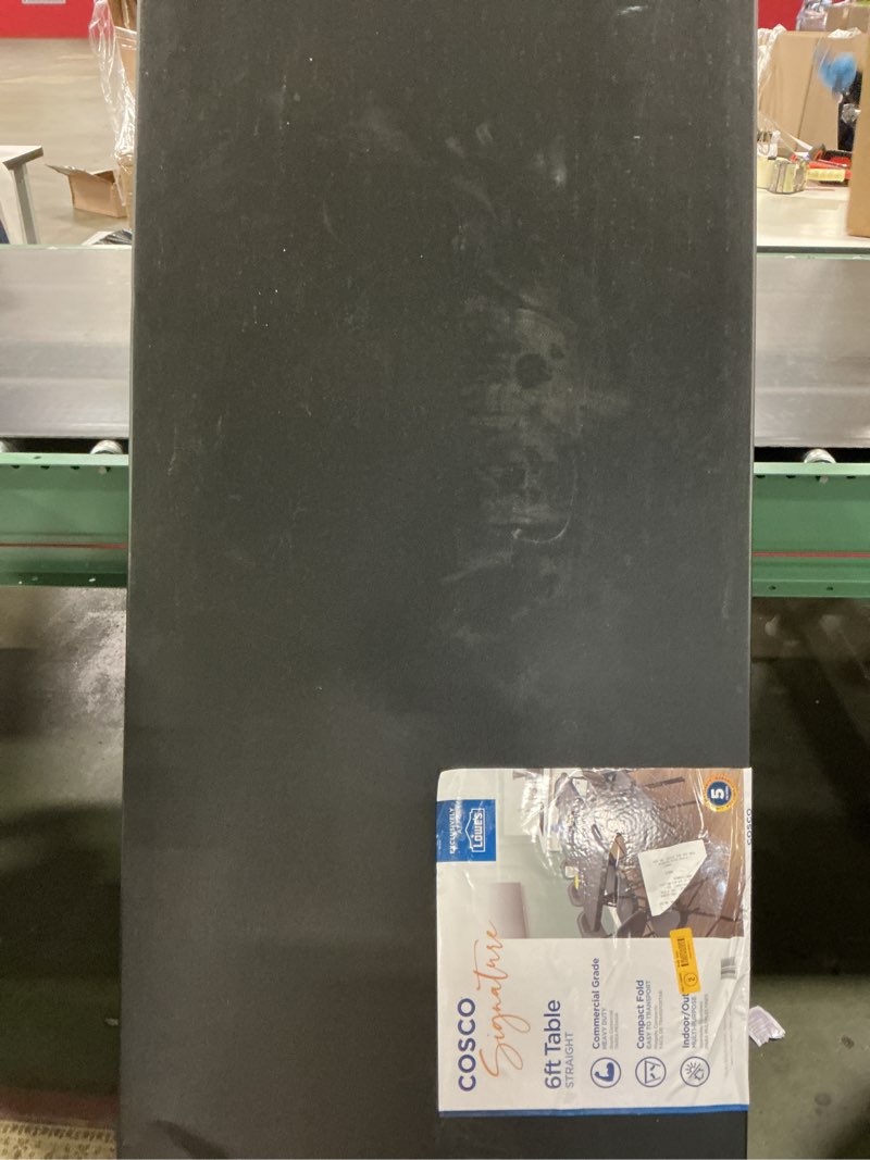 Condition photo showing As Is for Cosco 2.5-ft x 6-ft Indoor or outdoor Rectangle Resin Black Folding banquet table 8 -Person