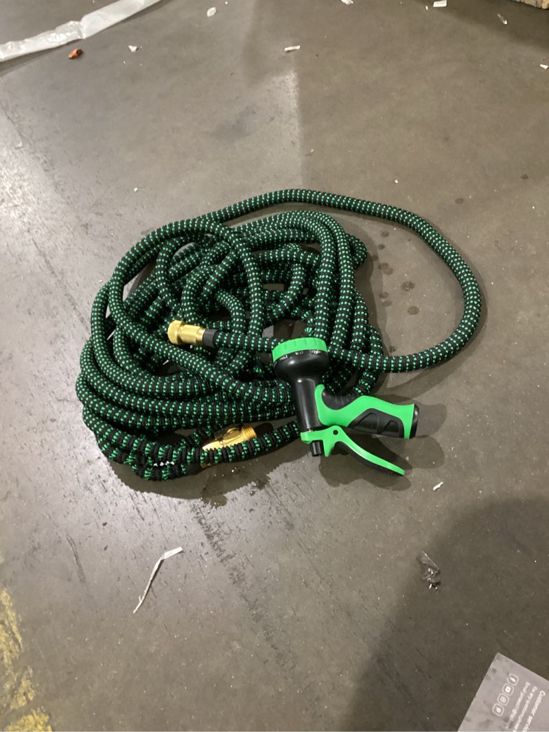 Condition photo showing As Is for flexi hose with 8 function nozzle, 25ft - lightweight expandable garden hose, no-kink flexibility, 3/4 inch solid brass fittings and double latex core - black and green green 25ft