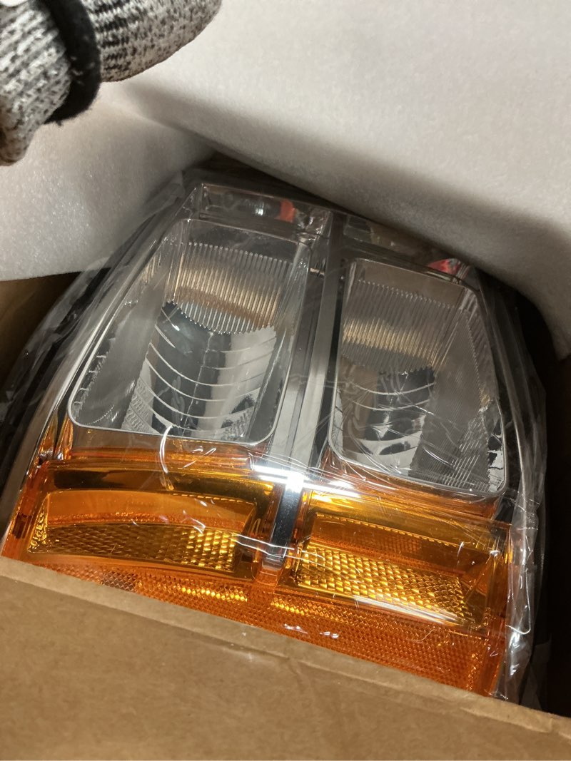 Condition photo showing Good Condition for Headlight Assembly Compatible with GMC Sierra 2007-2013 Halogen Head lamp, OE-Style Headlamp Replacement for 22853029 22853030 GM2502283 GM2503283, Bulbs Included, Black Housing Amber Reflector