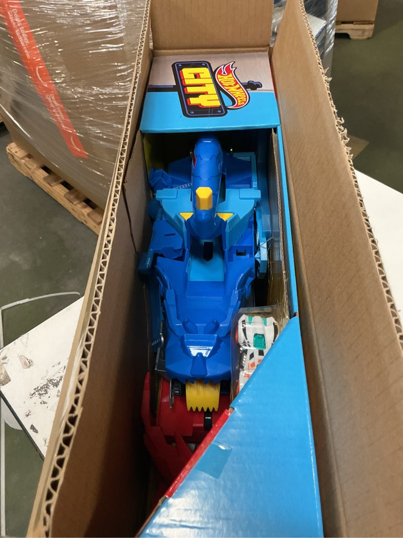 Condition photo showing Good Condition for Hot Wheels Toy Monster Trucks, Sharks vs. Dinos Dragon Destruction Playset with 1:64 Scale Great Bite & Rageasaur, Race to Defeat The Cyborg Nemesis Dragon Track Set