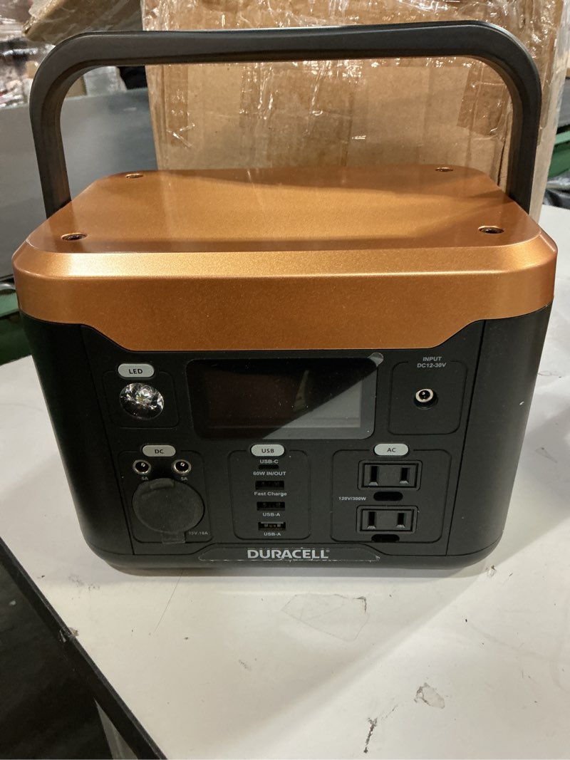 Condition photo showing As Is for duracell portable power station 300 lithium battery backup portable power pack for power outages, emergency kits, home electronics, and outdoor use (120v/300w)