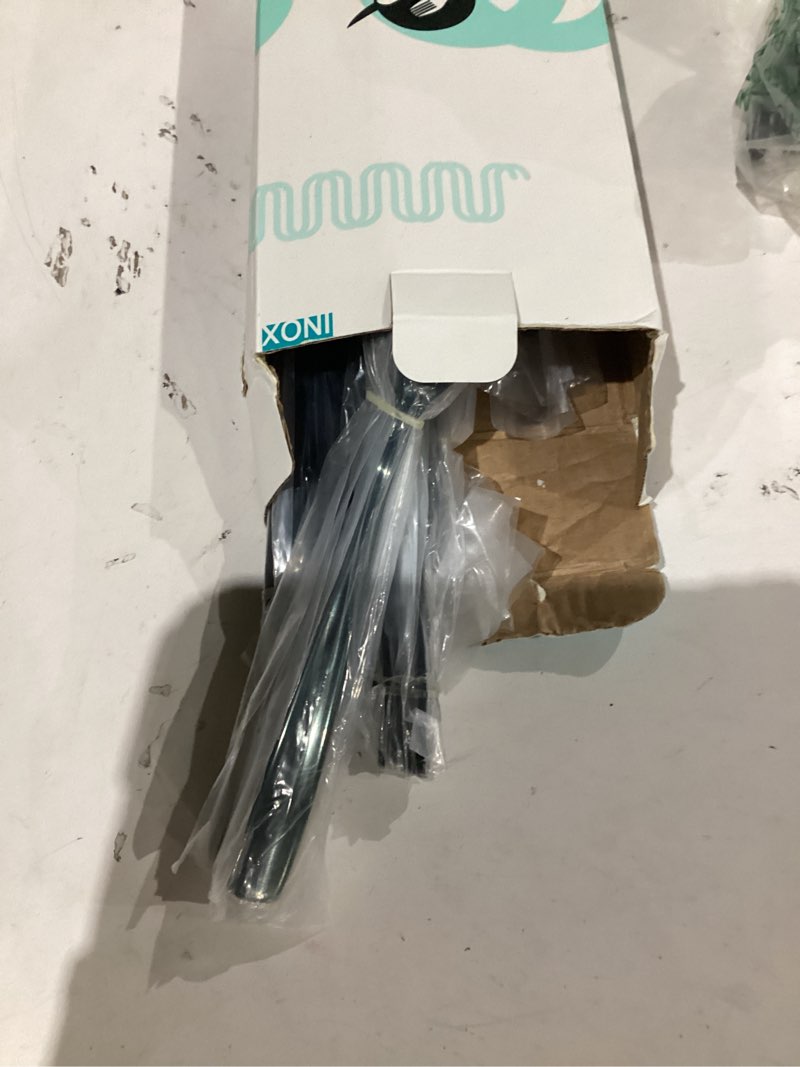 Condition photo showing As Is for 20 Piece Black Flatware Silverware Cutlery Sets,unique modern look,Home & Kitchen Stainless Steel Dinnerware/Tableware/Utensils Set For 4,Include Knives/Forks/Spoons Dishwasher Safe Black 20 Pieces Flatware Set