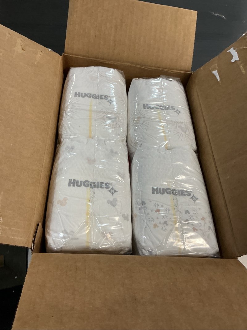 Condition photo showing New/Like New for Huggies Size Newborn Diapers, Skin Essentials Baby Diapers, Size Newborn (6-9 lbs), 76 Count, Packaging May Vary
