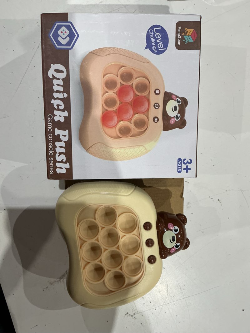 Condition photo showing As Is for intoypad pop the target! handheld speed push game machine: a fun multiplayer game for family. sensory fidget toy christmas toys gifts for 6 7 8 9 10 11 12 years old kids road trip car games kids bear
