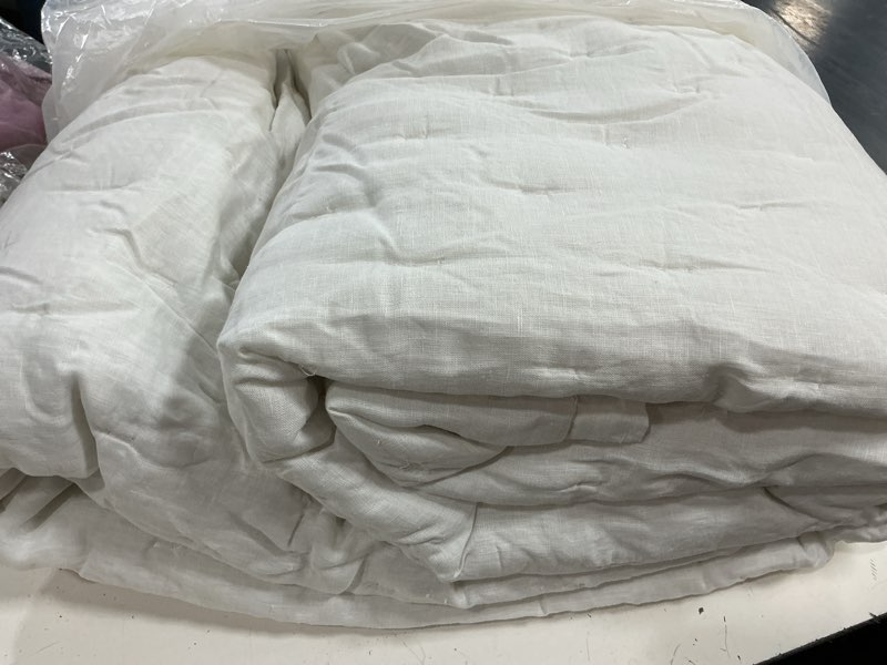 Condition photo showing As Is for european linen dream quilt, king/cal king, white