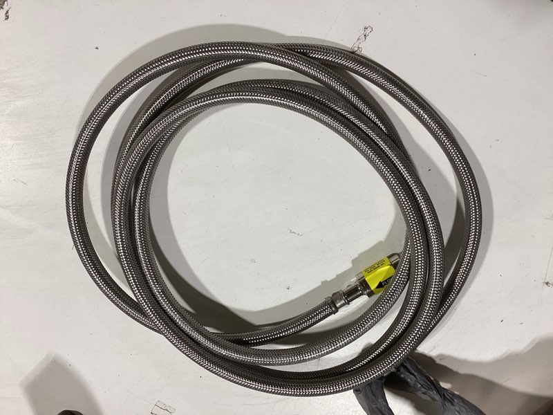 Condition photo showing As Is for eastman 10-ft 1/4 -in compression inlet x 1/4 -in compression outlet braided stainless steel ice maker