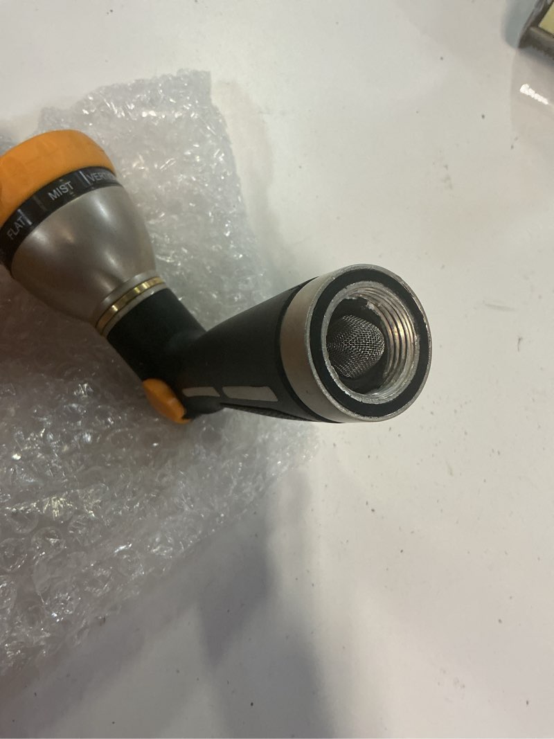 Condition photo showing As Is for fanhao garden hose nozzle heavy duty metal spray nozzle with thumb control, high pressure water nozzle with 8 adjustable spray patterns for watering plants, washing cars and showering pets black-8 patterns