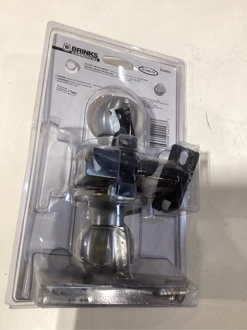 Condition photo showing As Is for brinks commercial satin chrome interior/exterior hall/closet storeroom door knob