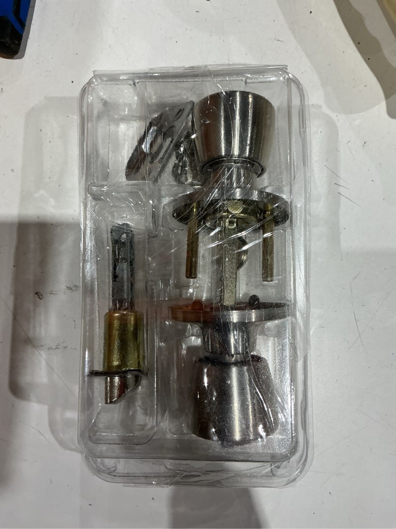 Condition photo showing As Is for hosom door knob with lock and key, keyed entry 1 pack, satin nickel