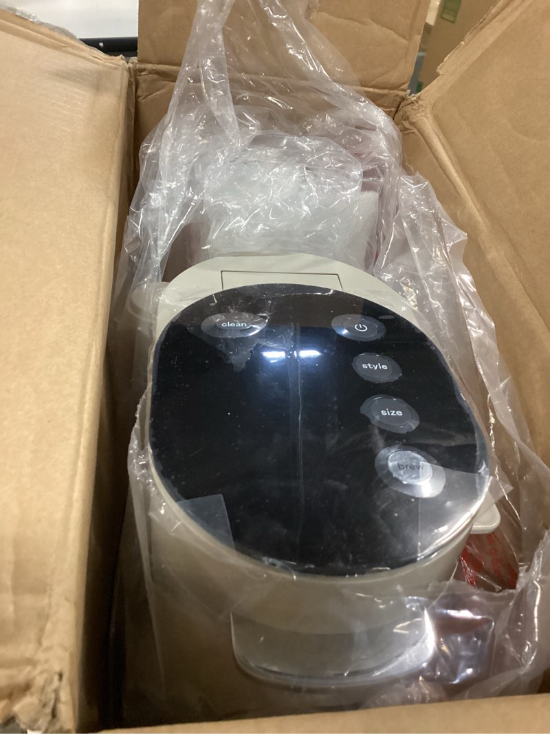 Condition photo showing As Is for Ninja Pod & Grounds Specialty Single-Serve Coffee Maker, K-Cup Pod Compatible, Brews Grounds, Compact Design, Built-In Milk Frother, 56-oz. Reservoir, 6-oz. Cup to 24-oz. Mug Sizes, Stone, PB051ST