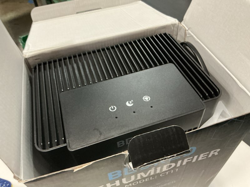 Condition photo showing As Is for dehumidifier, 95oz dehumidifier for home 1000 sq.ft - quiet with auto shut off & relaxing 7 color ambient light,ideal for livingroom, bedroom, basement(black)