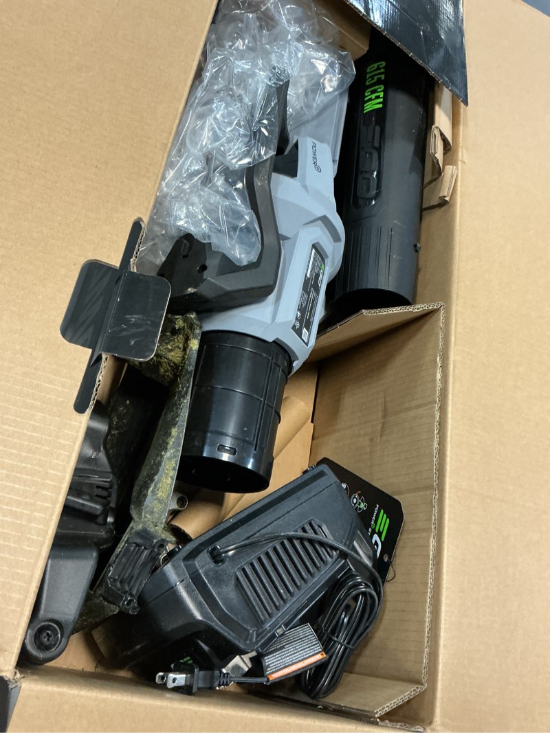 Condition photo showing As Is for ego power+ battery blower/trimmer kit (battery & charger)