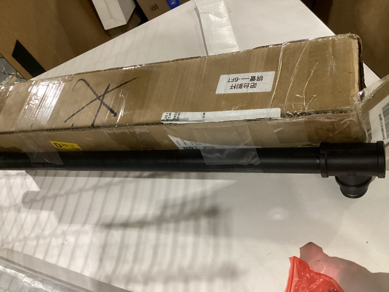 Condition photo showing As Is for black metal piping with floor flange