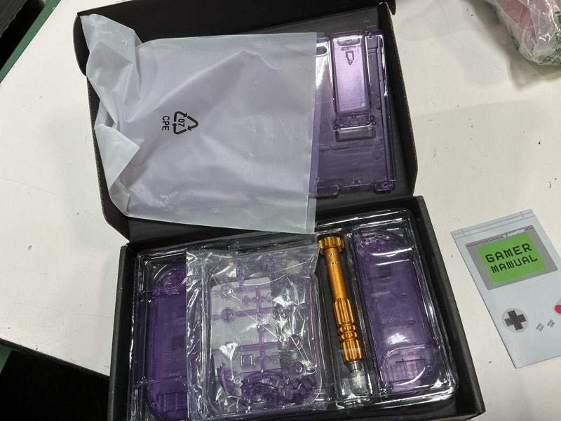 Condition photo showing As Is for extremerate diy replacement shell buttons for nintendo switch, crystal clear atomic purple custom back plate for switch console, housing case with colorful buttons for joycon handheld - no controller