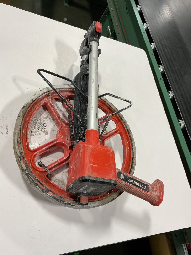 Condition photo showing As Is for 12" SAE Measuring Wheel