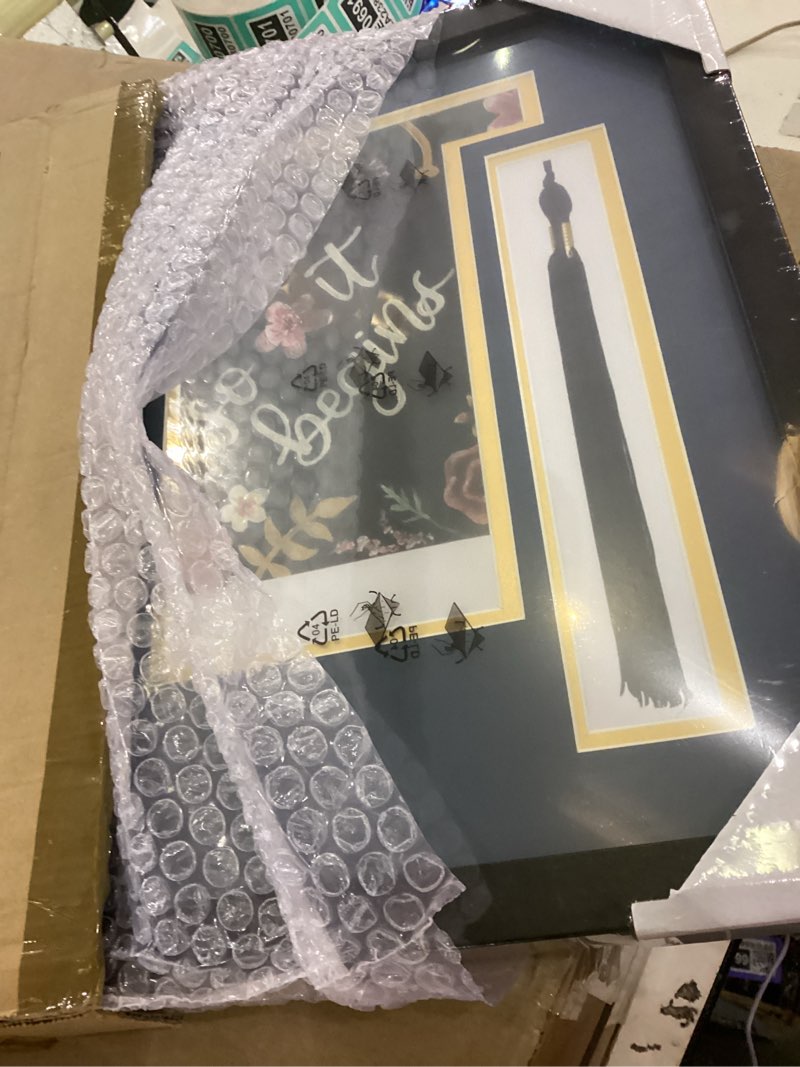 Condition photo showing New/Like New for 14x26 Black Shadow Box Diploma Frame with Graduation Cap & Tassel Holder for 8.5x11 Diploma and 4x6 Photo with MDF Wood and Plexiglass, Navy Over Gold Mat for Wall, Graduation Keepsakes Navy Mat 15*27