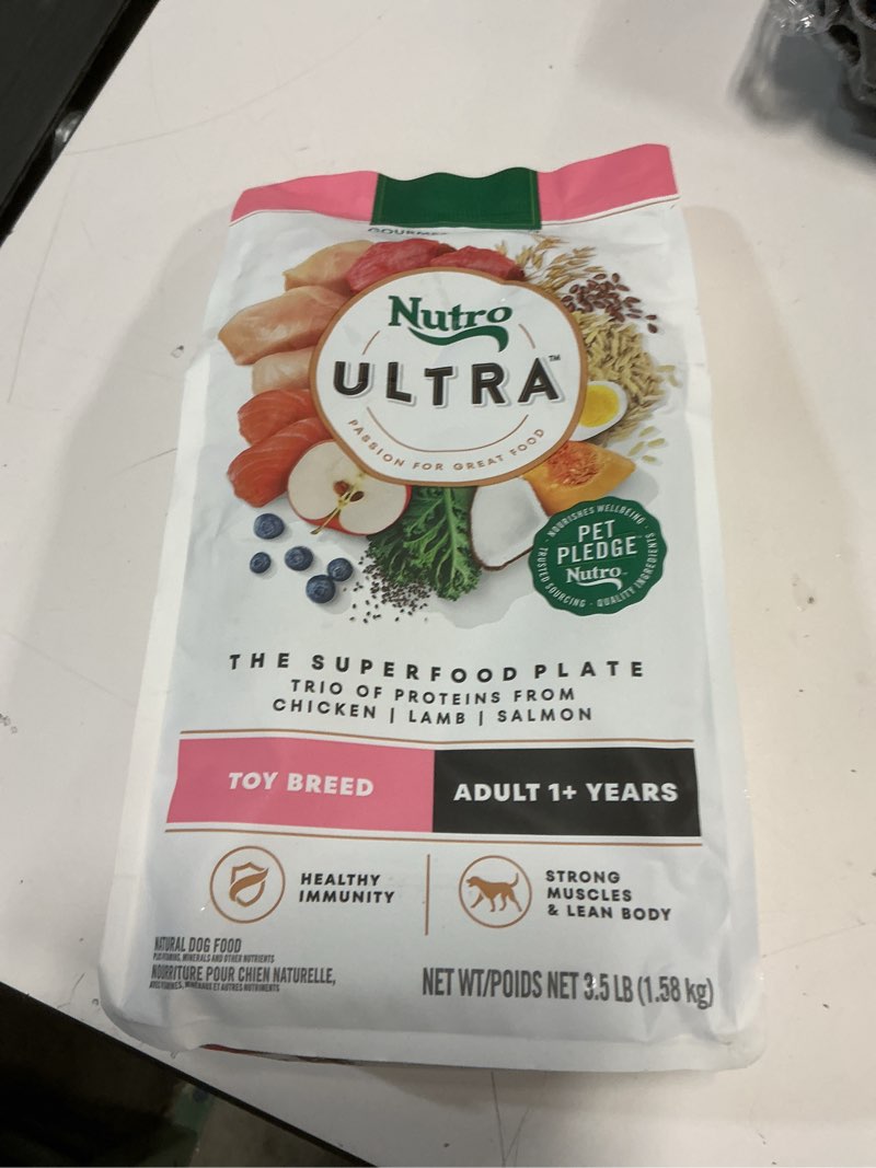 Condition photo showing New/Like New for (BBD 03/07/26). NUTRO ULTRA ADULT TOY BREED DRY DOG FOOD, CHICKEN, LAMB AND SALMON PROTEIN TRIO, 3.5 LB BAG