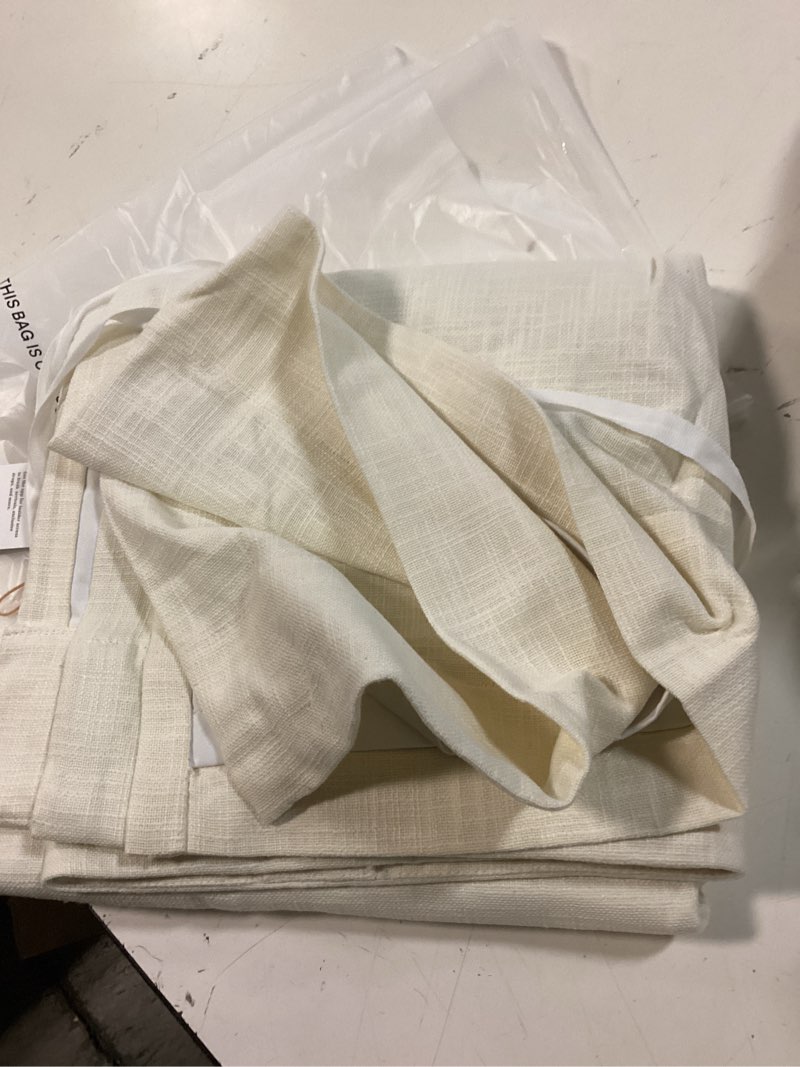 Condition photo showing Good Condition for textured cotton true blackout curtain color: ivory size: 48x96