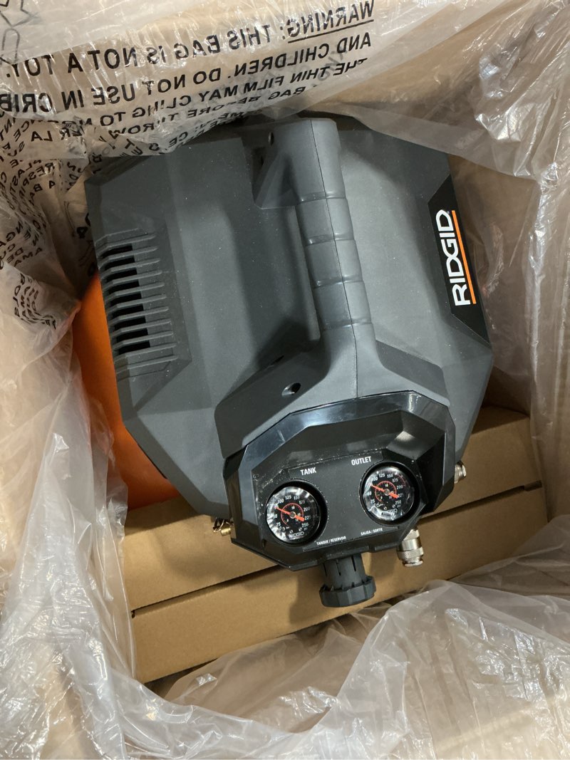 Condition photo showing Good Condition for ridgid 6 gal. 150 psi portable electric oil-free jobsite pancake air compressor with dual pressure gauges and 2-quick couplers