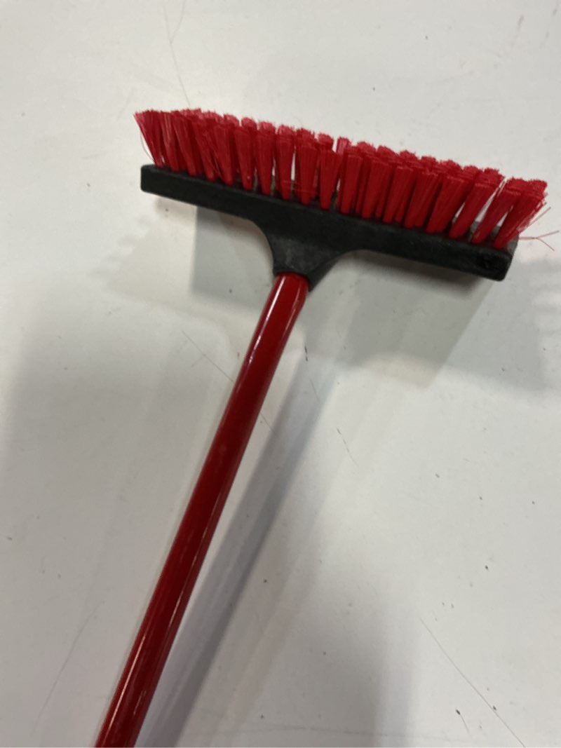 Condition photo showing Good Condition for 10.5 in. high power floor and deck scrub brush with steel handle